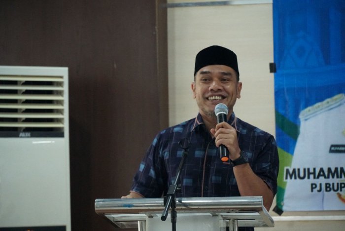 Ketua DPRK Aceh Besar Abdul Muchti Amd, menyampaikan sambutannya pada acara Konsultasi Publik RKPD yang digelar di Aula Bappeda Aceh Besar, Kota Jantho, Rabu (5/2/2025). Foto: Dok. MC Aceh Besar