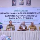 Sekretaris Perusahaan Bank Aceh, Ilham Novrizal, sosialisasikan Internet Banking Corporate (IBC) Kegiatan berlangsung di SMAN 1 Bireuen, Selasa (22/9/2026).