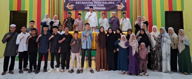 Plt Camat Kuta Malaka Fata Muhammad, S.Pd.I., M.M., membuka Training Center (TC) Kafilah Kecamatan Kuta Malaka sebagai persiapan menghadapi MTQ ke-35 Kabupaten Aceh Besar di Aula UDKP Kecamatan Kuta Malaka, Minggu (13/9/2026). (FOTO/Dok. Kecamatan Kuta Malaka)